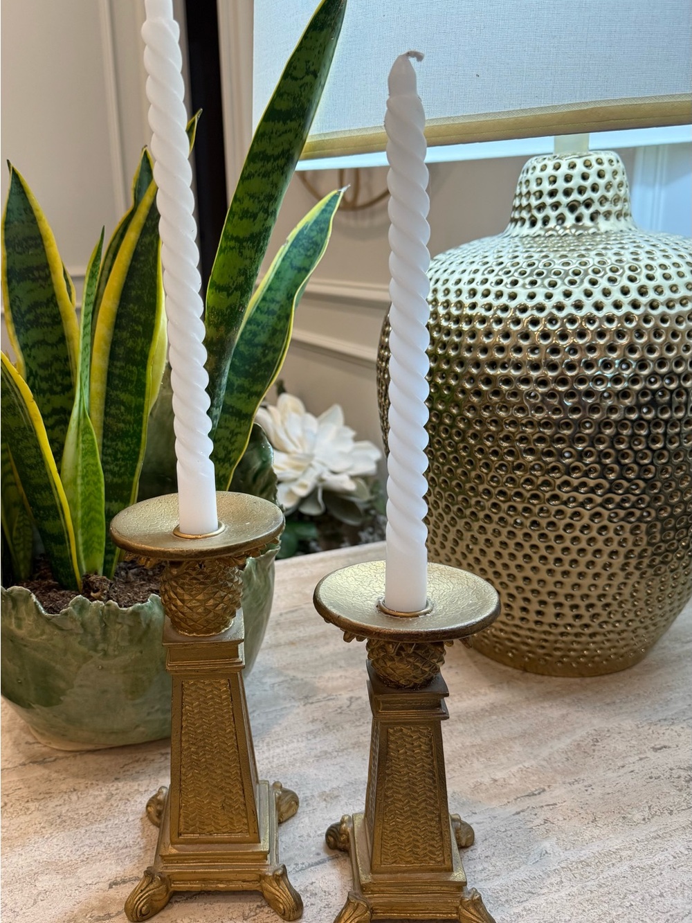 Pair of Gold Metal Candlestick Holders with White Taper Candles